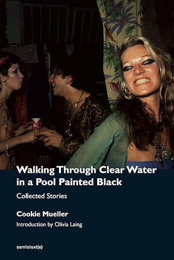 Walking Through Clear Water in a Pool Painted Black